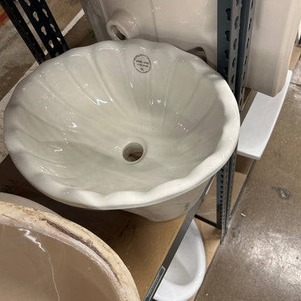 White drop in sink