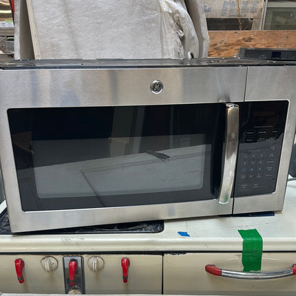 GE 1.6 cu. ft. Over the Counter Microwave