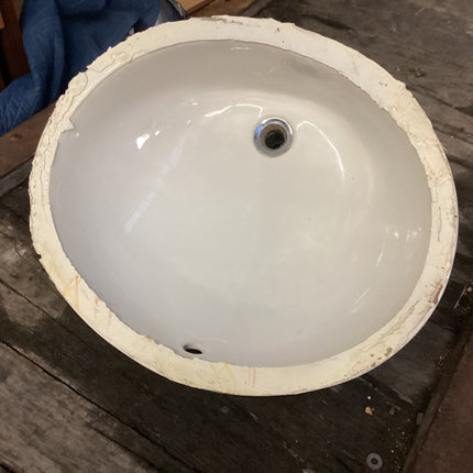 White drop in sink