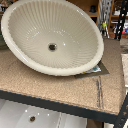 White drop in sink