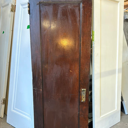 30x78.75 Dark Stained 1 Panel Wood Door